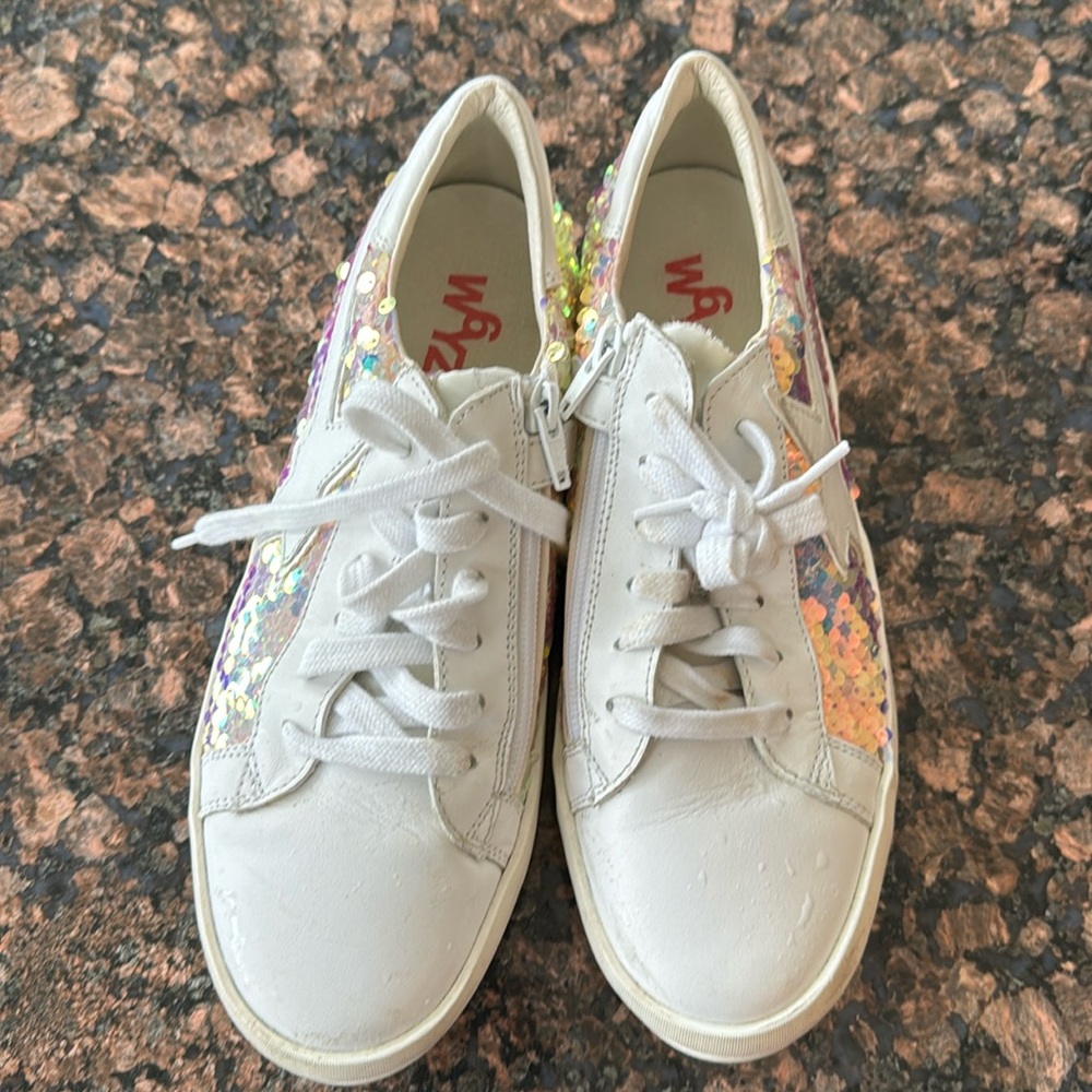 Girls used white sequence sneakers